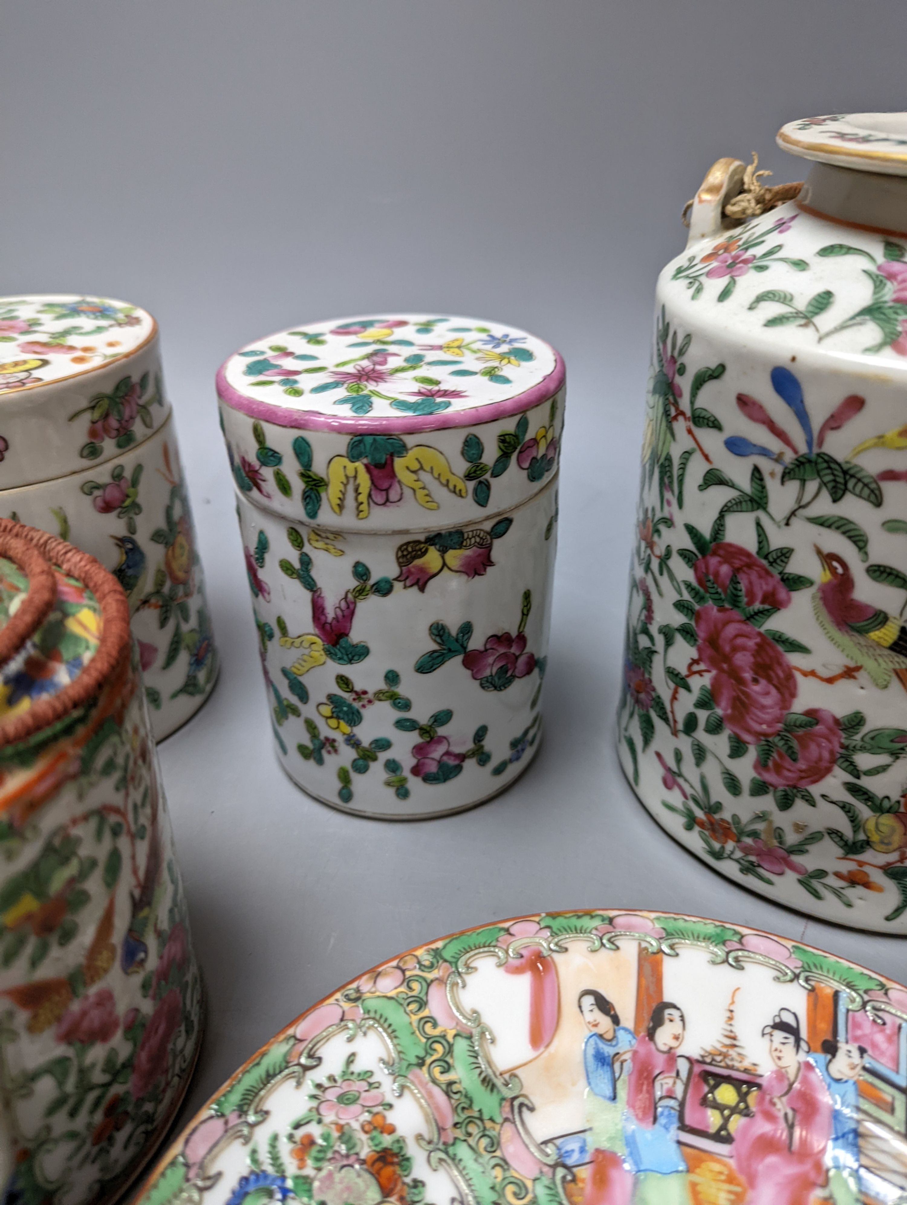 A group of 19th/20th century Chinese famille rose tea pots, plates, boxes and covers and a dish